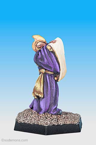 Wizard reading Spell Scroll